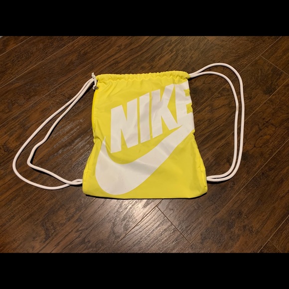 Nike string backpack. Yellow with white logo.